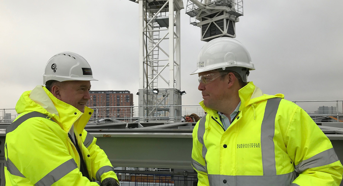 burohappold's tweet photo. Yesterday our Chief Operating &amp; Financial Officer @jabbruce had the pleasure of visiting #TheFactoryMCR as 1 of the many #roof trusses was being craned into position. With the roof &amp; walls largely complete, the facilities' immense scale was very apparent from this 7th floor view. https://t.co/LCUzcHu9BL