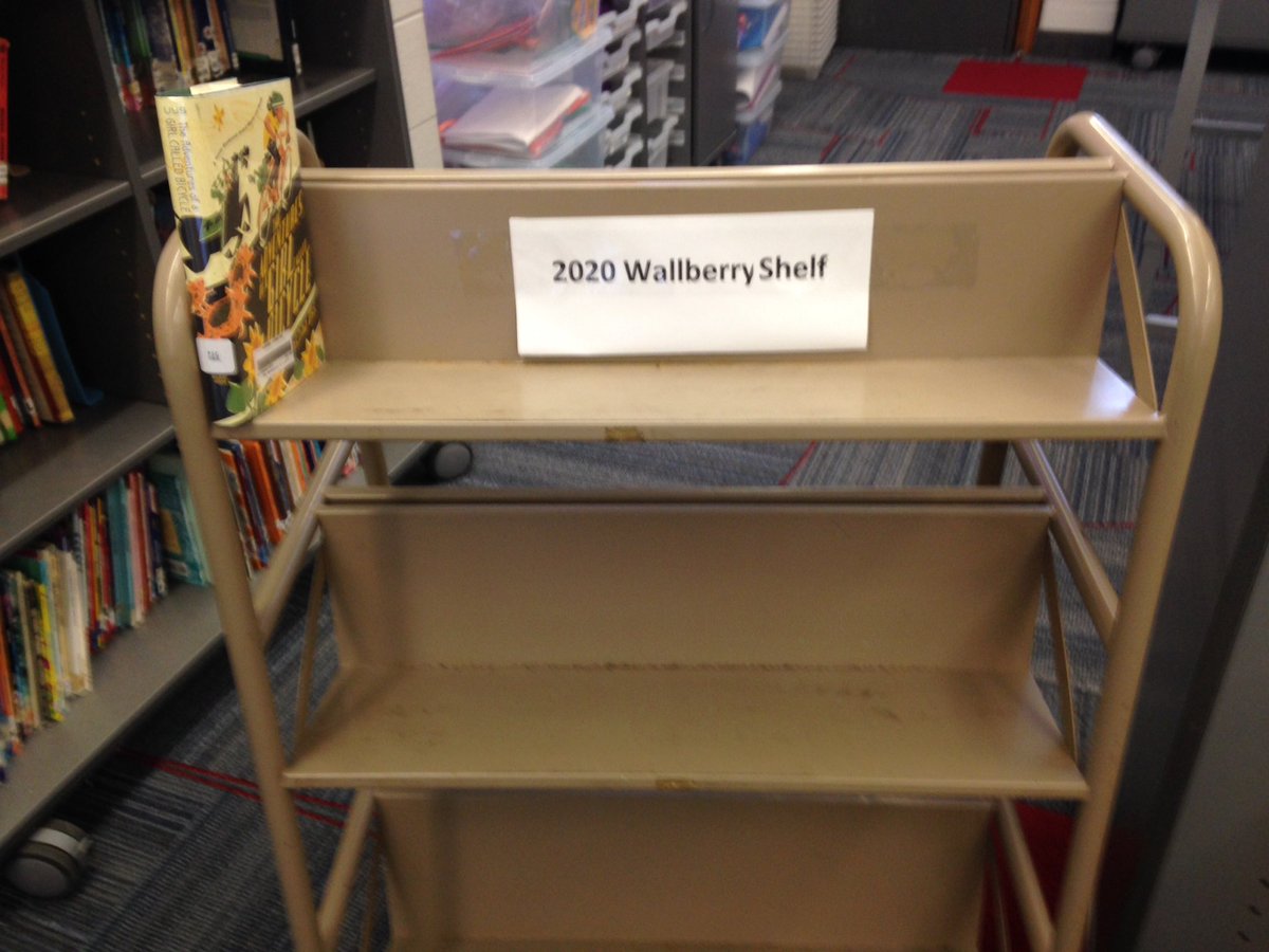 entwist412's tweet photo. Wall berry shelf before and after book talking the titles #whylibrariansareimportant #wleced  #CommerceElem @WalledLkSchools @CommerceElem https://t.co/b0ZAsuph7E
