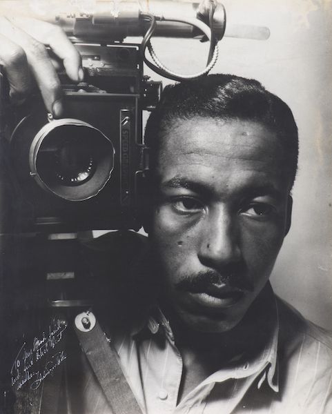 black and white self portrait of photographer Gordon Parks