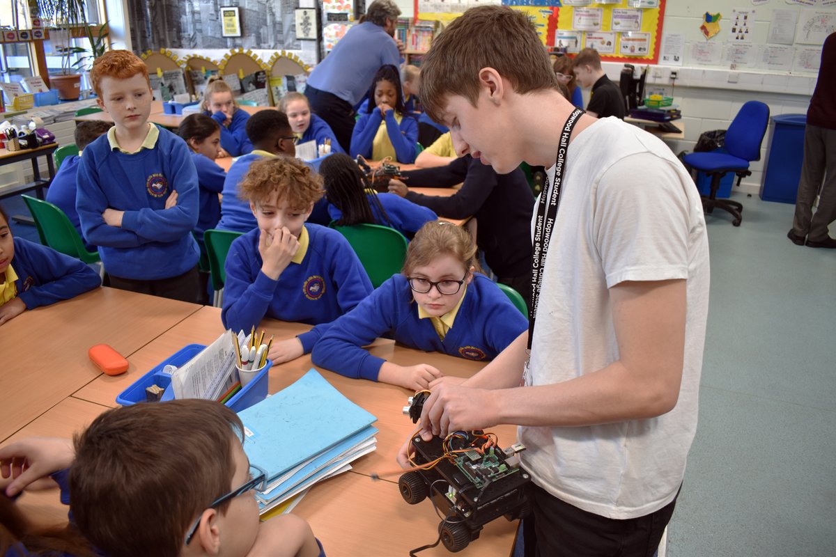 hopwoodhall's tweet photo. IT students and staff had a brilliant #GMDigitalSkillsDay at our friends and neighbours @HollinPrimary. They taught year 6 about basic coding and its use in robotics. Looking forward to more classes in the future! #DoSomethingDigital https://t.co/75OvDgNYcx