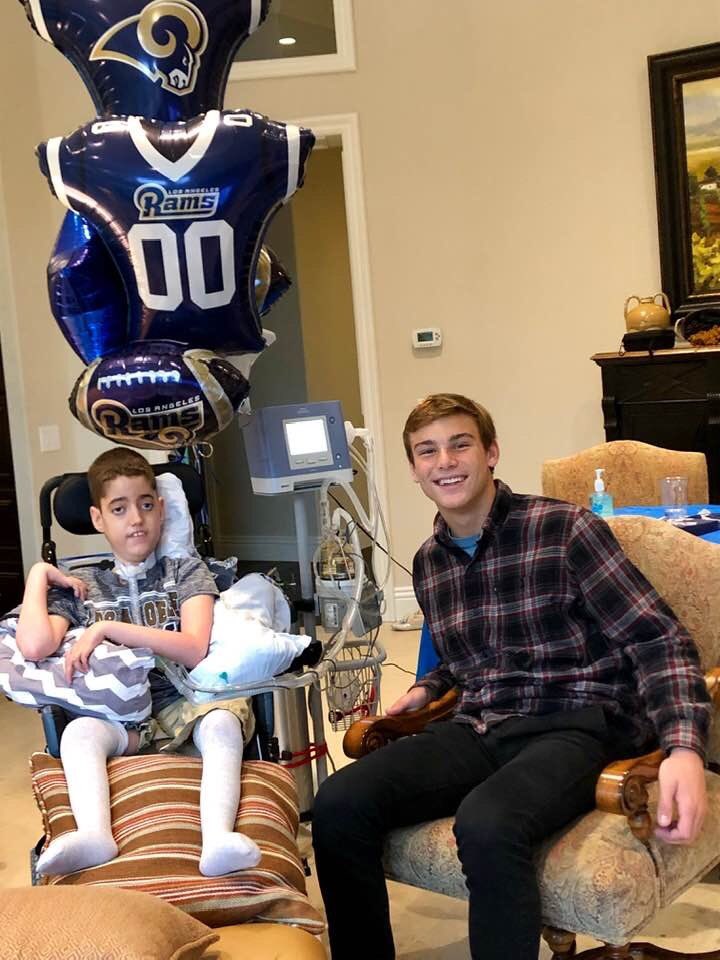 LightzOfHope's tweet photo. This is a picture of Zachary and his good friend Jack Stevens cheering the #Rams on in the Super Bowl last year. 

The Super Bowl was one of Zachary’s favorite days of the year.

#RememberingZachary
#ZacharyWoodardFoundation
#LightzOfHope
#SuperBowl 
#49ers
#Chiefs https://t.co/vS3ypOFwSw