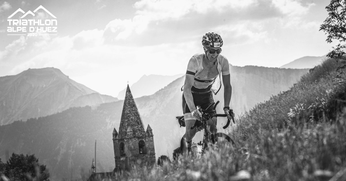 alpe_triathlon's tweet image. You take an old church, some mountains for the surrounding, a triathlete living one of the most brutal experience of his carrier, a steep road between 2 bends, some heat... and you get the best pic to wish you a happy week-end. #Alpedhueztriathlon #blackandwhitephotography