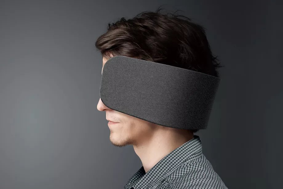 an image of a man wearing panasonic's distraction blinders (similar to the ones horses wear)