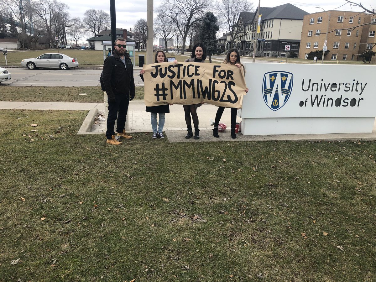WindsorLawILS's tweet photo. Red Ribbon Tie Up @WindsorLaw Shkawbewisag Student Law Society and @UWindsor Native Student Alliance spread awareness of #MMIWG https://t.co/poB74wITJR