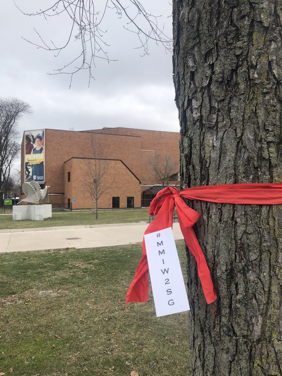 WindsorLawILS's tweet photo. Red Ribbon Tie Up @WindsorLaw Shkawbewisag Student Law Society and @UWindsor Native Student Alliance spread awareness of #MMIWG https://t.co/poB74wITJR