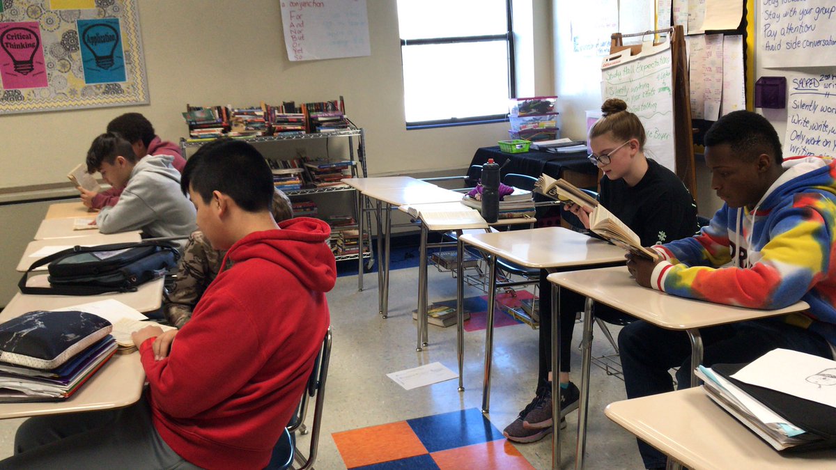 Working hard on our fluency skills by partner reading “The Giver” in WIN. #gkcogs