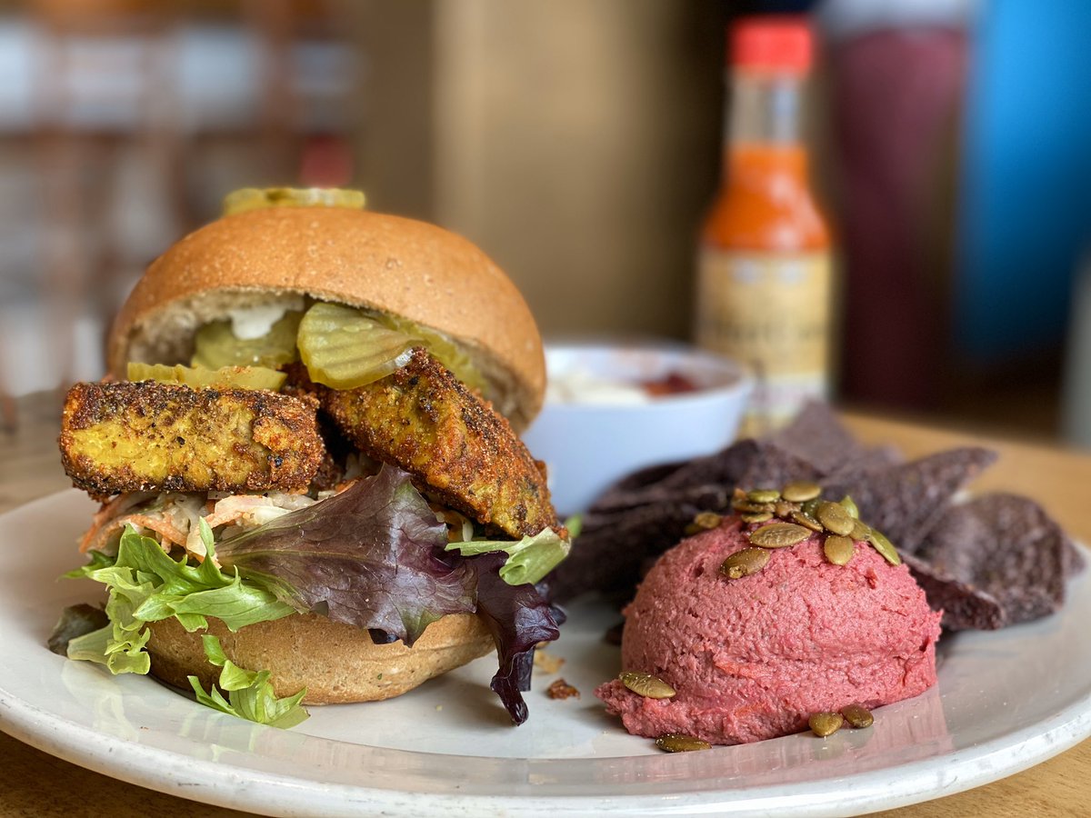 🌱Friday’s Special🌱
“Nashville Hot Tempeh Sandwich”
*snow day means hot tempeh*
- hot seasoned theory, greens, southern coleslaw, ranch, pickles &amp; a side! *GF as a salad*
Side #1: Roasted Beet Hummus
Side #2: Potato Artichoke Salad
Soup of the day: Beet Chili w/ Sour Cream *GF*