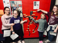 MCUSD223's tweet photo. MC’s Student Wellness Committee learned about the 206 bones that make up the human body by labeling a child size skeleton. They learned about the femur, the largest bone in the body, and that there are phalanges in both your hands and feet. #meridianwellness WeAreMCUSD #MCRocks https://t.co/8hbd54KYt8