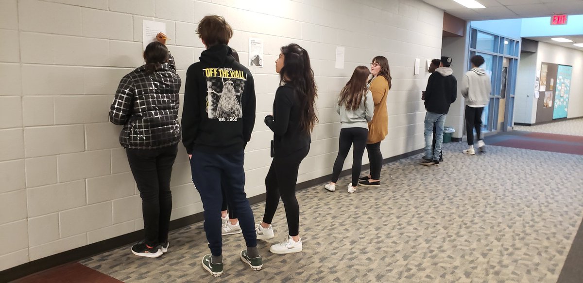 Akc_DisneyDiva's tweet photo. English 10 class using a Gallery Walk to discuss Ch. 4-6 of Night. Great thinking in the hallway! #WICORwhileyouworkLSW https://t.co/9z9AZMkelb