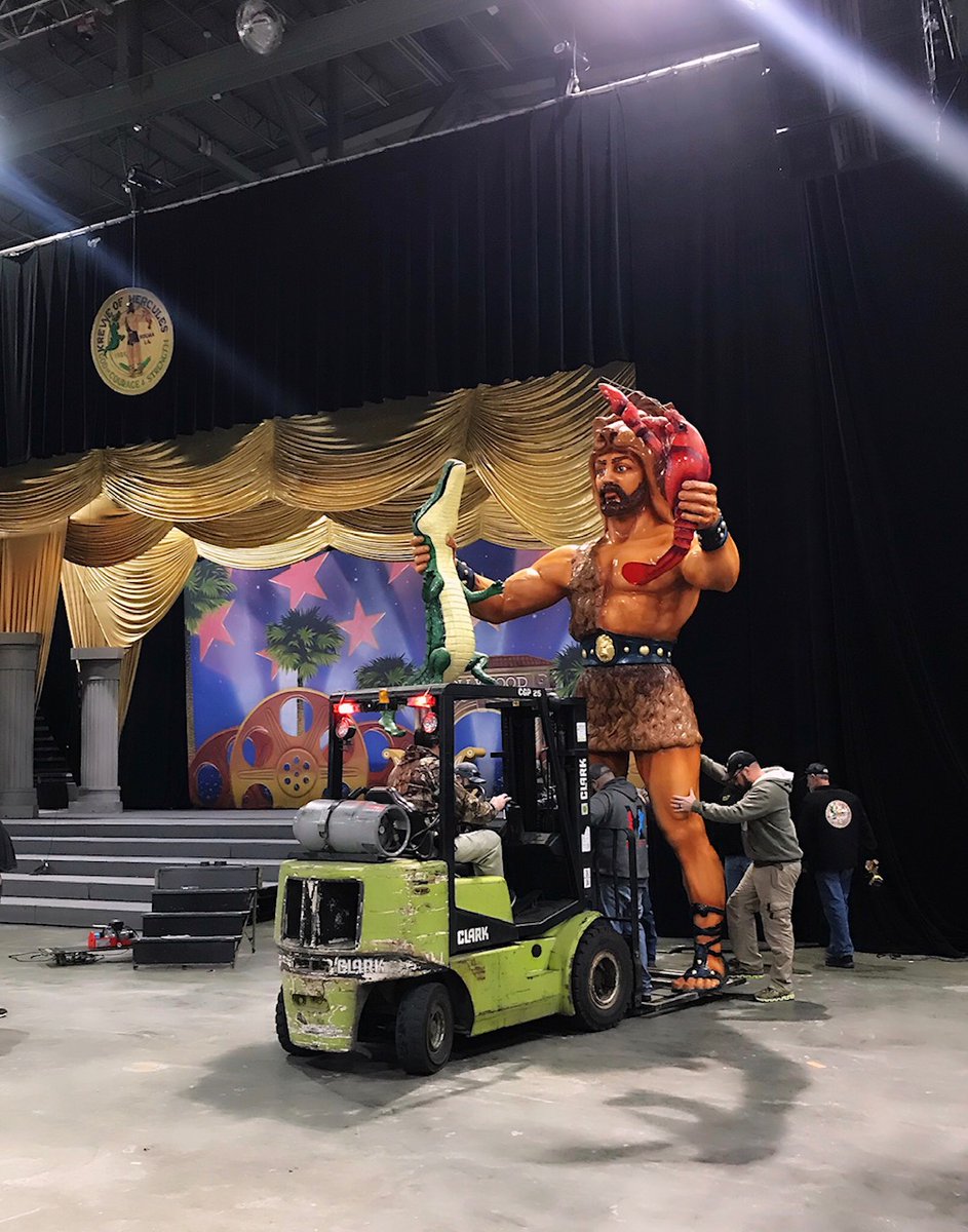 HoumaEvents's tweet photo. 🎭The Krewe of Hercules moving into the Houma Civic Center for Saturday night’s Tableau/Ball 🐊 The Gator Float all lit up &amp; the Hercules statue all set for the big event! #mardigras2020 #kreweofhercules #mardigrasfloat #houmaciviccenter #event #houma #mardigrasball https://t.co/XM1J3PRwL3