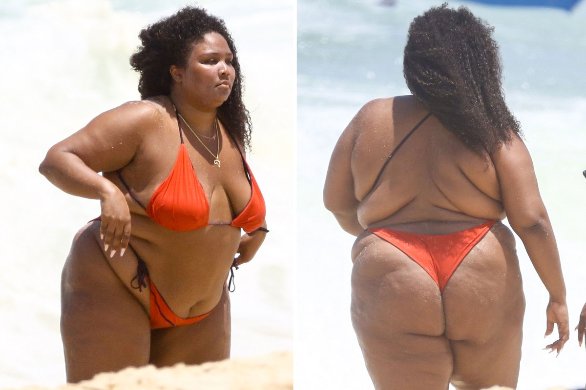 PageSix's tweet image. Lizzo rocks tiny red bikini beachside during Brazilian vacation trib.al/YJafZ1R