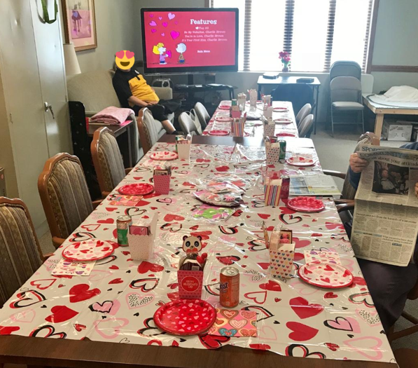 SusieQ6shooter's tweet photo. Threw the residents at our local assisted living place a #ValentineParty today! Got my #CupidWings on &amp; then it was time to #Party! The residents enjoyed the #GoodyBoxes   &amp; making #Valentines. #Grandma always helps out &amp; the residents love talking to her. #DravenTheTherapyCat https://t.co/ehrMQFrTbH