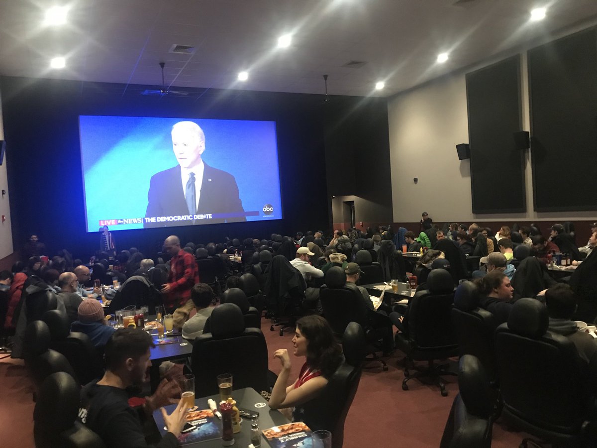 marchandsteve's tweet photo. A full house taking over a theatre at Chunky’s in Manchester to watch ⁦@AndrewYang⁩ once again rock out the latest DNC Debate. #YangGang #YangIsBack https://t.co/OvkEQXgbFq