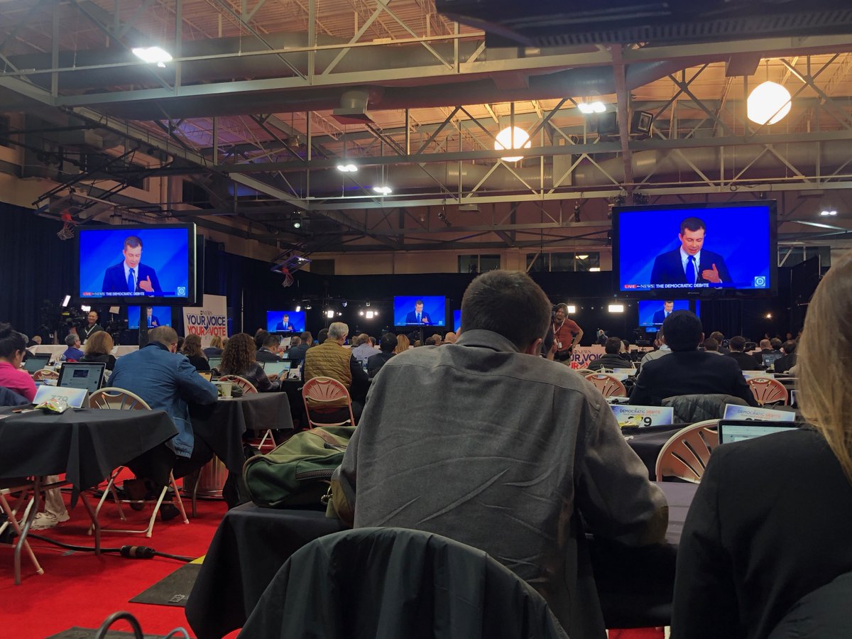 disabilityvoter's tweet photo. BTW..here is our view from the file room at the New Hampshire #DemDebate. We were given assigned seats on the aisle to make it easier to get in and out (we both use wheelchairs). #CripTheVote #Election2020 #nhpolitics https://t.co/3lxkyRPFQx