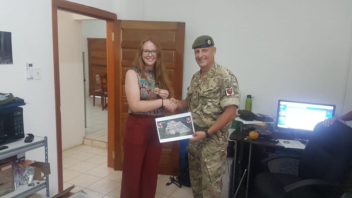 Comd BATSUB Lt Col Simon Nichols MBE presented Miss Becky Wooldridge of Panthera with a Commanders Coin and certificate in appreciation for all her dedication, help and assistance in helping to ensure environmental compliance, protection of animals and those training in Belize.