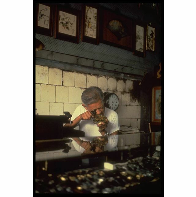 A watch repairer works at his street-side store in the early 1980s. Watch mending stores were once common and could be located rather easily, tucked in small corners of the heartlands or inside watch retail shops. It is slowly becoming a vanishing trade … bit.ly/2OCCFo5