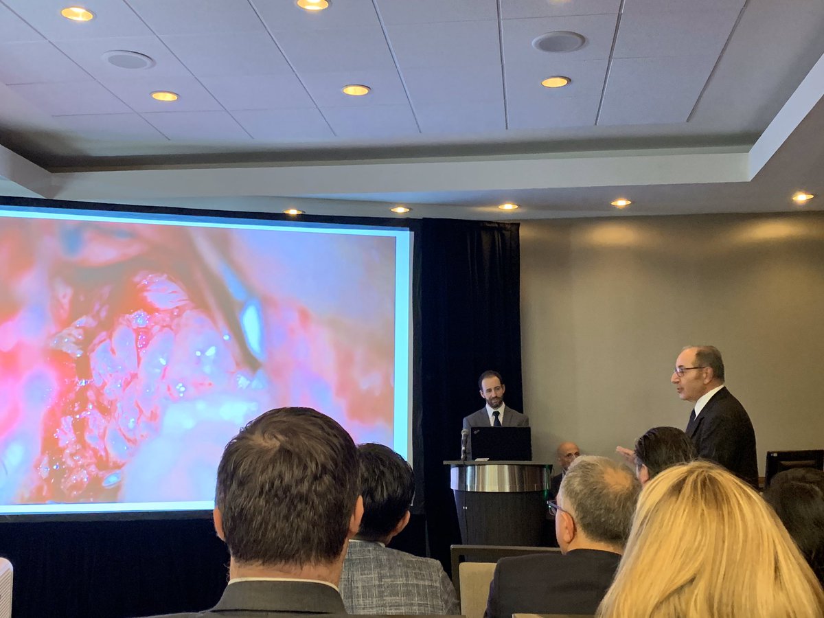 Big thanks to @MKBaskayaMD and @PeteMorone (shown here as the MC for Ossama Al-Mefty’s talk) for proctoring an informative #opvid session on petroclival meningiomas yesterday. Looking forward to more at #NASBS2020 today! @NASBSorg @VUMC_Neurosurg