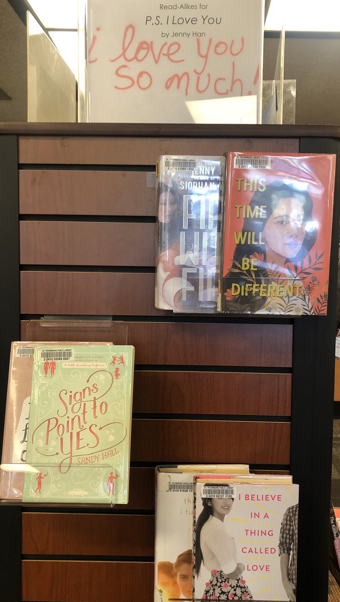 Book display with titles that are read alikes for the YA book "PS I Love You" by Jenny Han