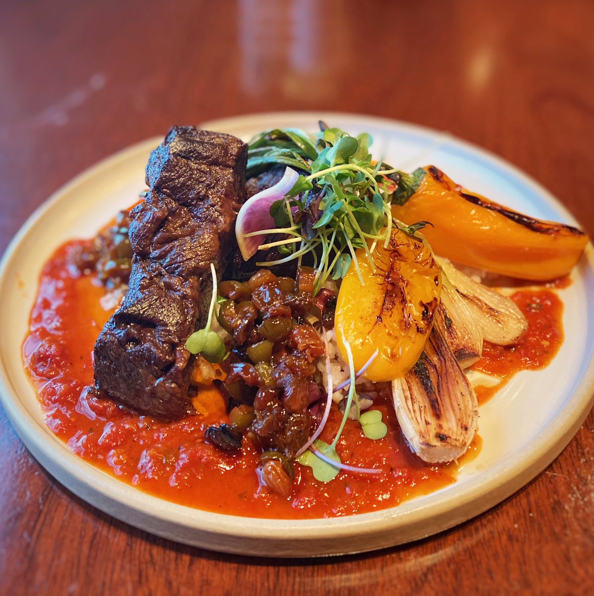 Smoked Brisket “Ropa Vieja” ‼️
#dinnerspecial  W/ sorfito vegetables, smoked tomato braising jus, olive and raisin agridulce, plantation rice. 😋 #smokedbrisket #ropavieja #eater #hangry #foodie #durhamnc #raleighnc #dtraleigh #trifoodies #durham #dpac #mez_durham #bullcity