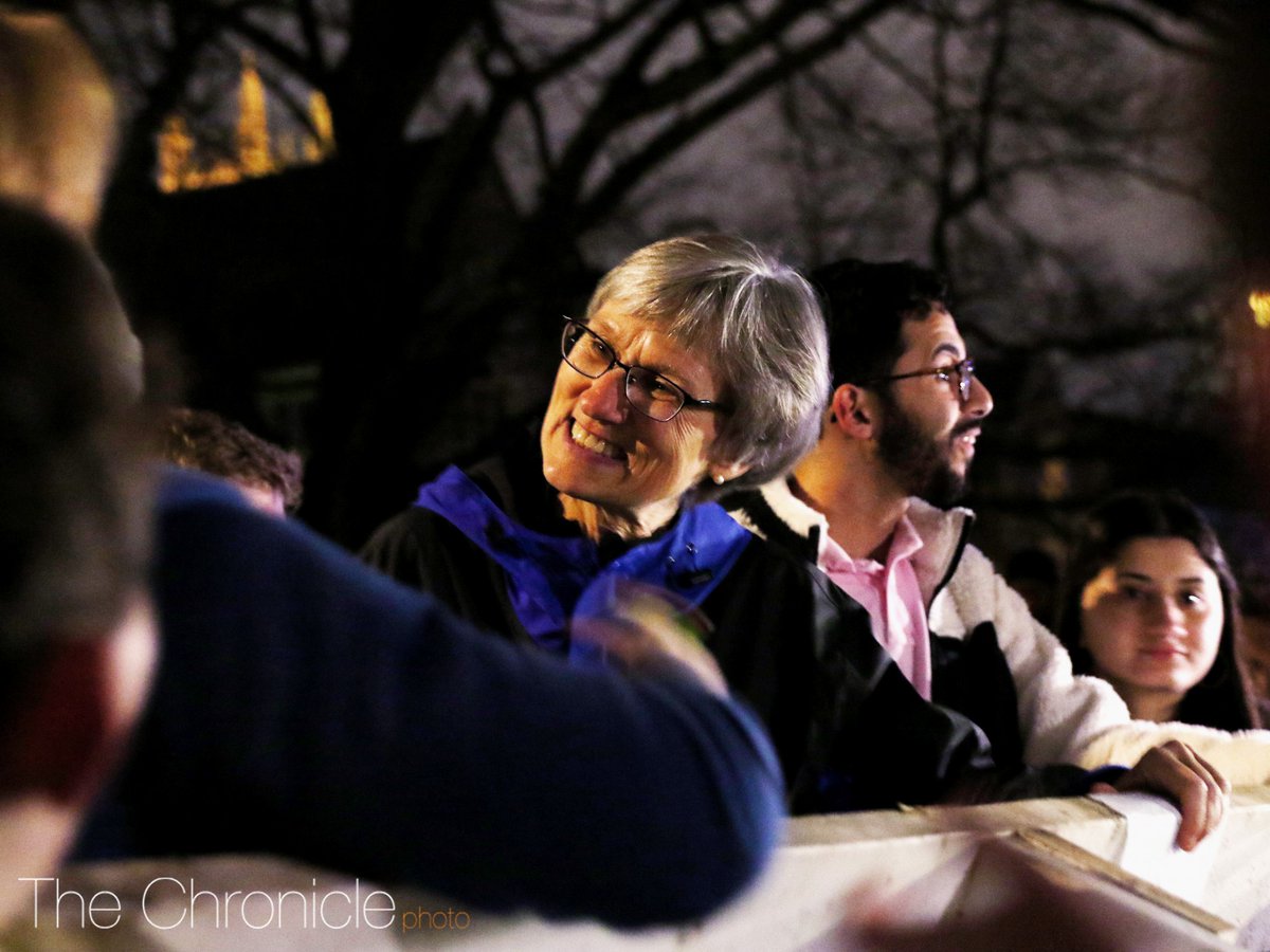 DukeChronicle's tweet photo. Duke students surrounded a campus bench and attempted to burn it Saturday night. But despite students carrying lighters and offering her vodka, one administrator stood her ground atop the bench:
https://t.co/6LpKEuziHw https://t.co/UIsB8IUmUN