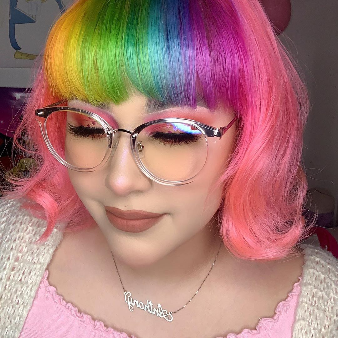 arcticfoxcolor's tweet photo. Whoever thought of rainbow bangs first deserves a dang award! 🏆👏 This style is truly one we can't stop gushing over! Get a similar colorful 'do when you use the AF colors of the rainbow! 🌈💸 (IG: babeindreamland) 

#rainbowbangs #arcticfoxhaircolor #dyeforacause https://t.co/gdYjBn58Ac