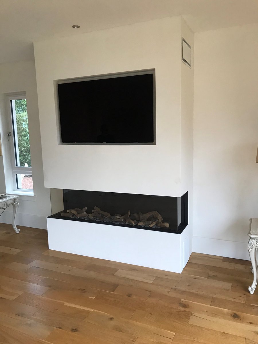 By integrating our customers TV into the fireplace we where able to create a stylish streamlined solution that perfectly matches their home. come Visit us in store 7 days a week to find the perfect stove for you Gas or solid fuel we have the solution for you. <a href="/BF_GasFires/">Bellfires</a>