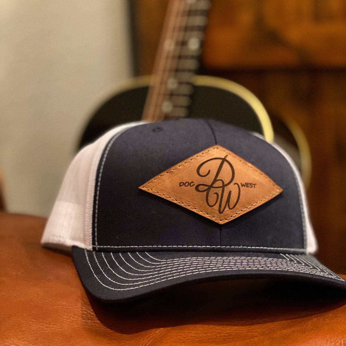 DocWestMusic's tweet photo. New cap style. What y’all think?! Would you buy one!? #newmerch #countrymusic #docwest #texasmusic #holtzleather https://t.co/iFvNCJDLrI