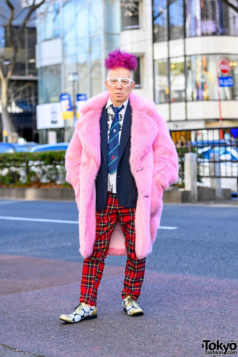 Tokyo Fashion on X Soji on the street in Harajuku wearing a colorful look including items by legendary Japanese fashion brand Comme Des Garcons with a pink faux fur coat