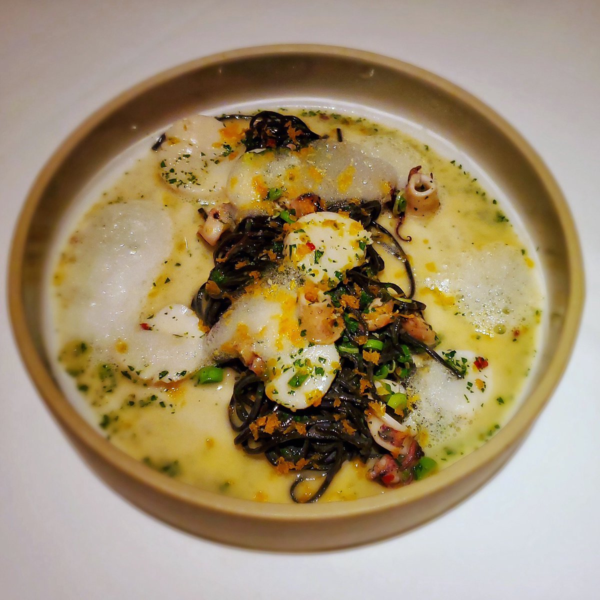 Check out our new #pasta! Homemade squid ink #angelhair with local #squid, #scallops, bottarga and #uni (#seaurchin)!