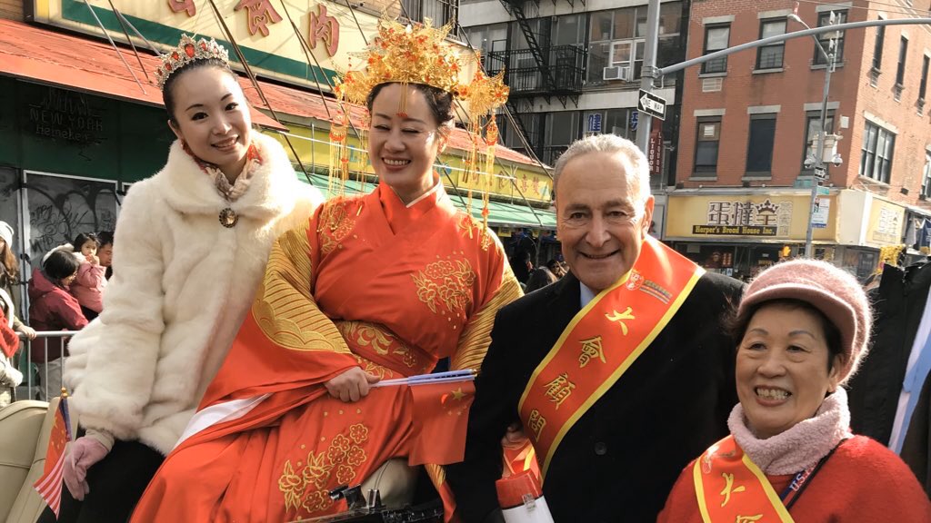 ‪Senator Schumer marches in the Chinatown Lunar New Year Parade in New York City‬.