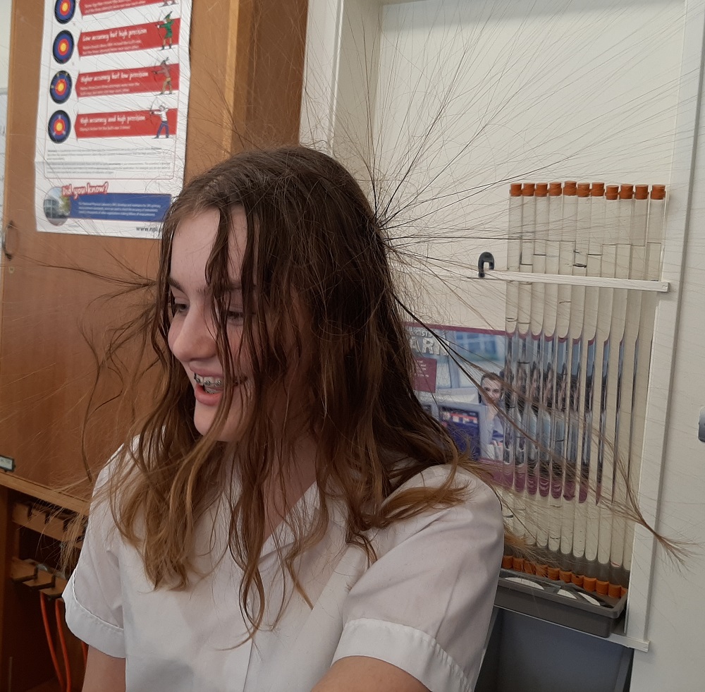 KESWitley's tweet photo. Shocking discoveries as #KESWScience pupils participate in a hair-raising electrostatics experiment! #KESWinspire #Greatfun https://t.co/da3Q838wMn