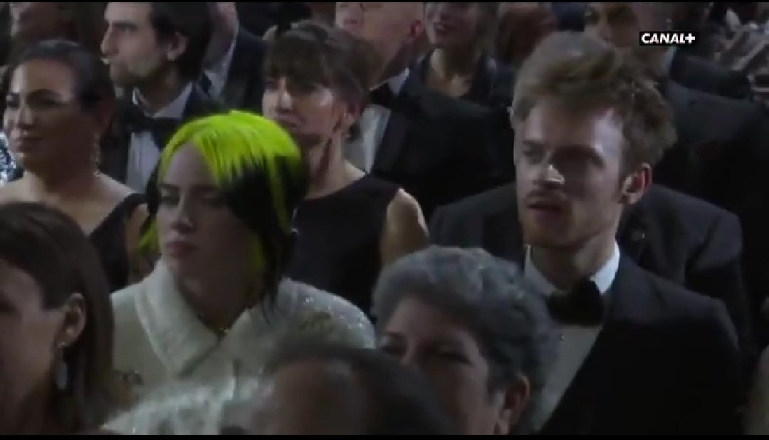 Lowkeyyverse's tweet photo. Billie eilish watching eminem perform his heart out and probably realised that whispering isn't a talent. 😂

#Eminem #Oscars https://t.co/BnFGqUdfRC