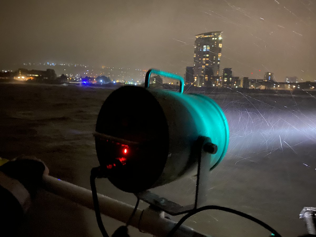 RNLI's tweet photo. Volunteers from @TheMumblesRNLI battled 70mph winds whipped up by #StormDennis during a multi-agency search. Deputy Lifeboat Coxswain James Bolter said: ‘This was a ferocious storm and one of the worst we’ve launched into in many years.' 📸 Andy Miles. https://t.co/RWGK9NvPD3
