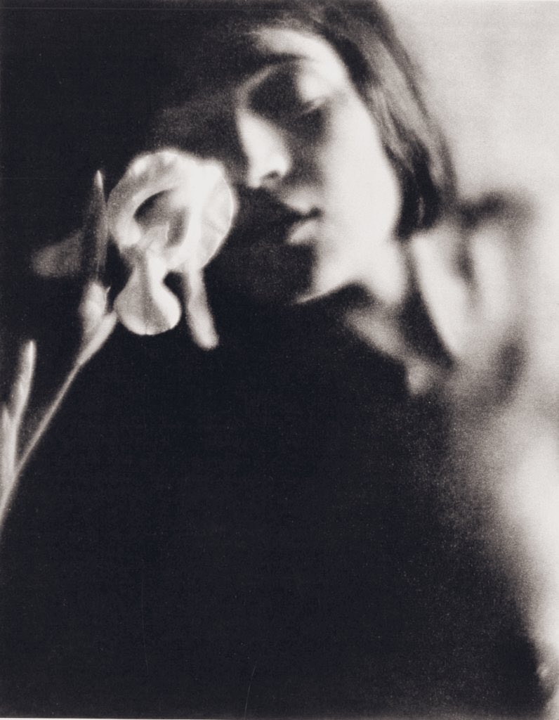 #TinaModotti, 1921.  Photo #EdwardWeston The white iris.
Pure your gentle name, pure your fragile life,
bees, shadows, fire, snow, silence and foam,
combined with steel and wire and
pollen to make up your firm
and delicate being.

#PabloNeruda’s epitaph for Tina Modotti