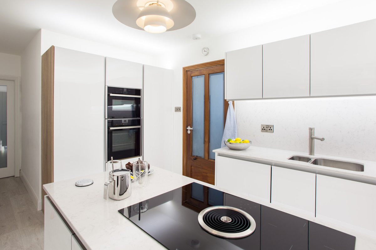 CelticInteriors's tweet photo. This ultra #modern @CelticInteriors #kitchen is a Gloss White with Lagoon quartz &amp; features a state-of-the-art hob from @BORAGmbH. It also features a concealed #utility
#interiorlovers #homeinspiration #homedesign #homeinspo #kitchendesign #irishinteriors #madeinireland🍀 https://t.co/2Be2F9j4Wz