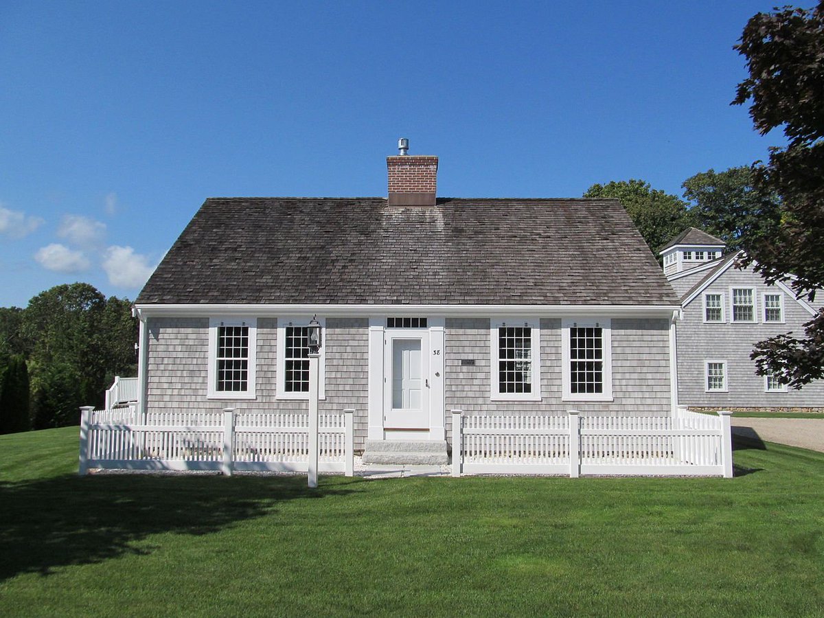 the Cape is enough of a distinct area to have a named house style - the "Cape Cod House" is a one-storey with a steep pitched roof and five bays: the door in the middle and two either side. this one belonged to a man named Nymphus Hinkley.