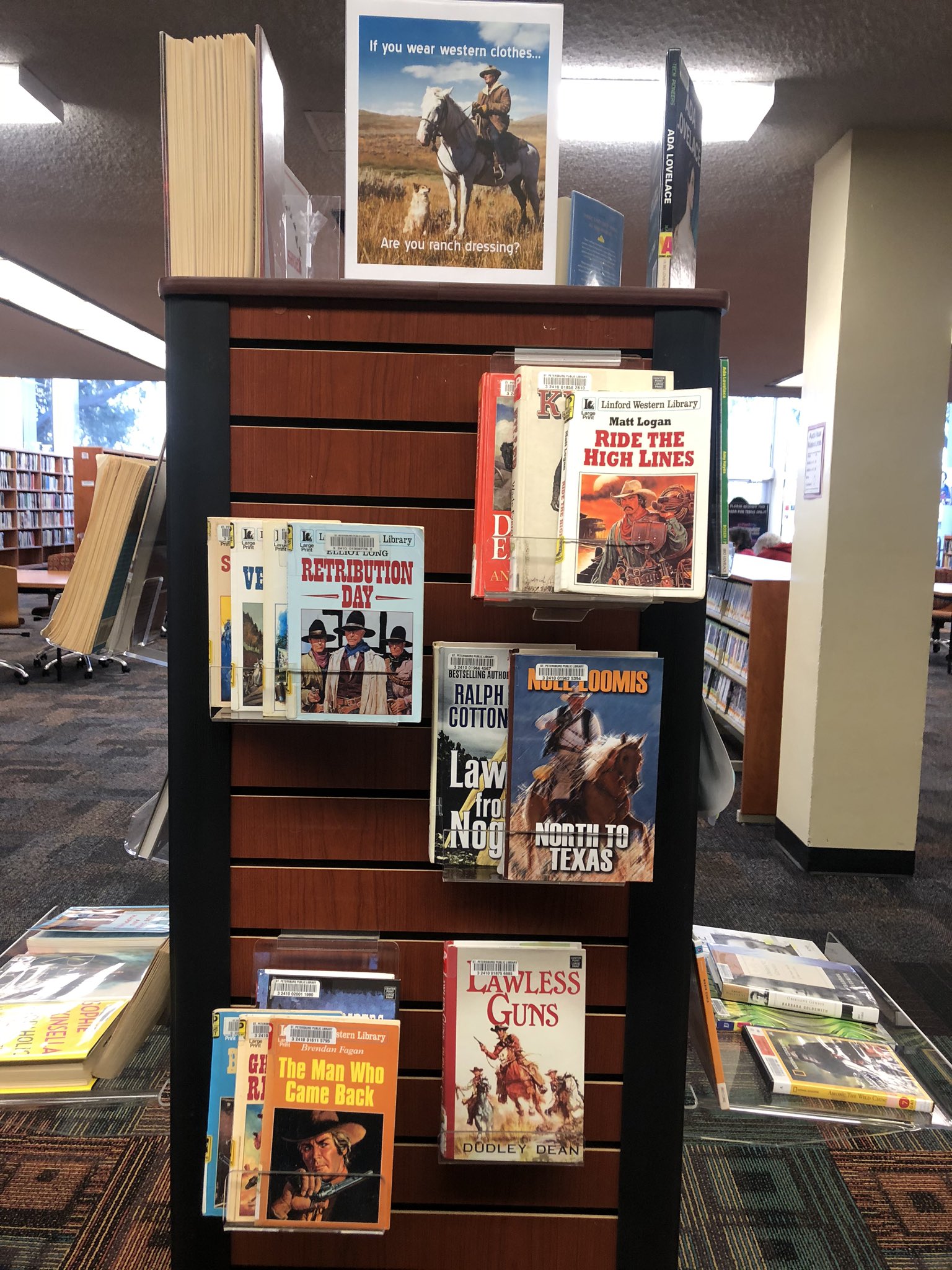 Image of book display with various western books