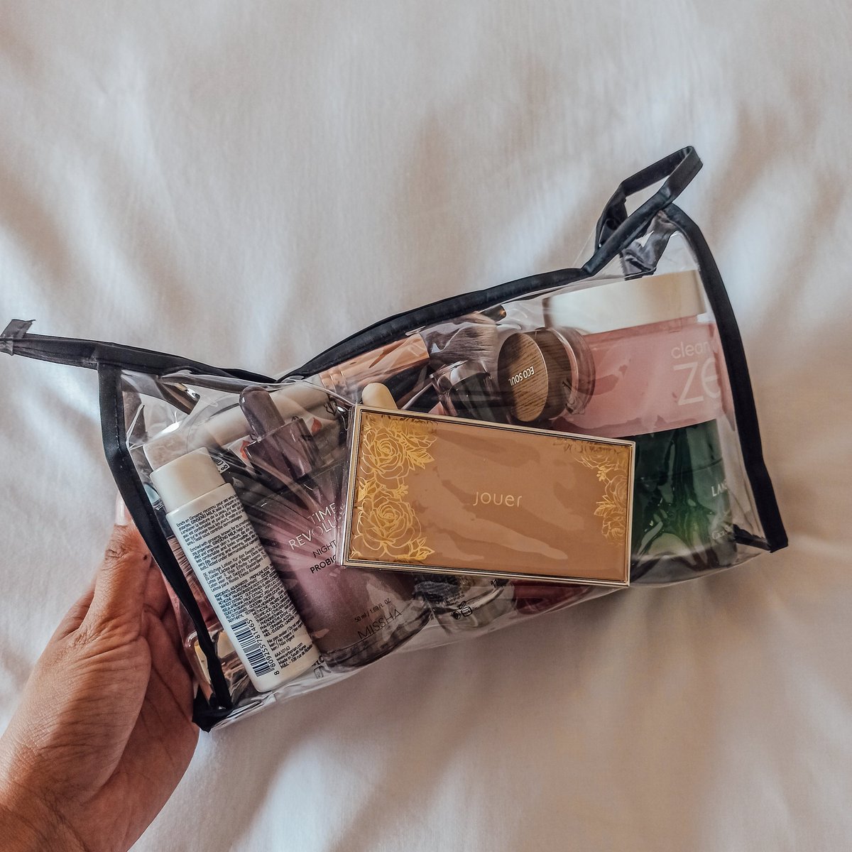 Travel skincare + makeup. In one bag 