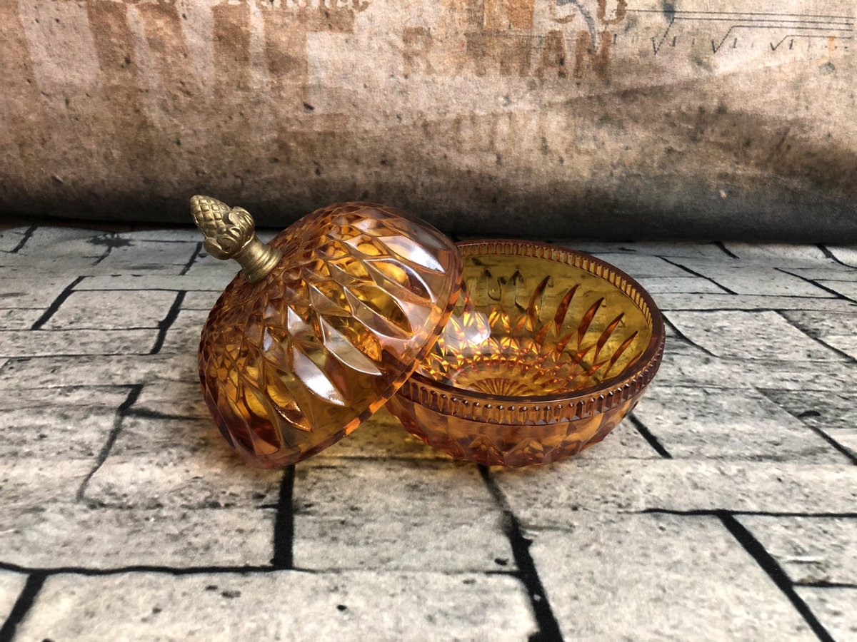 Excited to share this item from my #etsy shop: Vintage indiana glass amber candy dish #housewares #amberglasscompote #acornknobcompote #acornknobdish #brassacornknob #midcenturydish #retrocandydish #vintagecandydish #indianaglass  etsy.me/2SBpJzZ