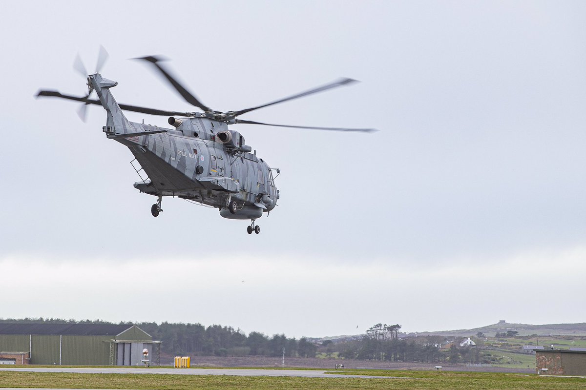 Our resident @RafPhotog Cpl Armstrong grabbed these images of a Royal Navy Merlin here at Valley today. Got to say — nice paint scheme!