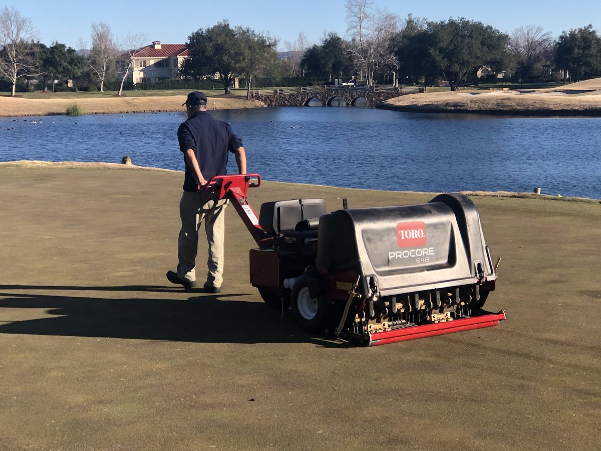 RubyAgronomy's tweet image. Taking advantage of a closed Monday to needle tine the greens. Really like the rear rollers attachment.