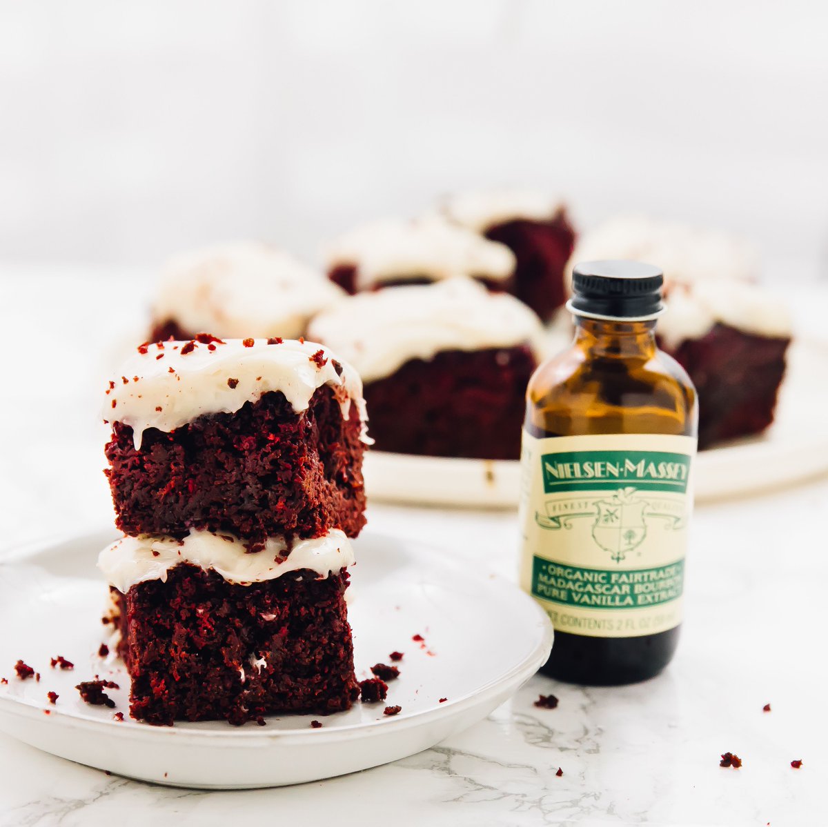 NielsenMassey's tweet photo. This Valentine’s Day bake from the heart by whipping up a batch of our Vegan Red Velvet Brownies with Cream Cheese Frosting. The perfect gift for the dessert lover in your life. https://t.co/V84vGEXpvF #BakeforYou #NielsenMasseyInspires https://t.co/gdAMrweroY