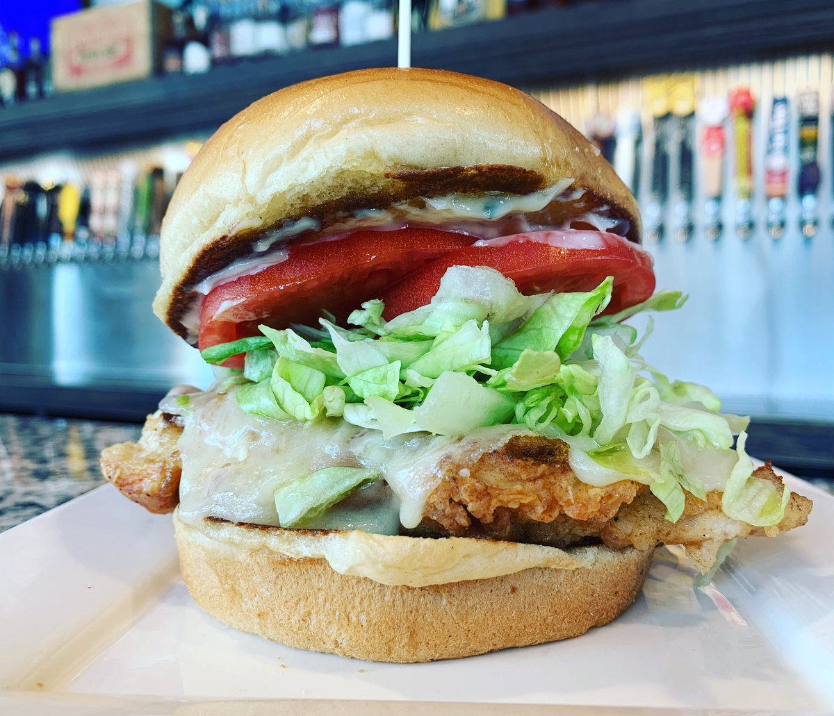 BOW: Picatta Someone Yer Own Size

Pan-Fried Chicken
White Cheddar
Lemon-Thyme Mayo
Vine Ripe Tomato
Iceberg
Brioche

#pintroomlittleton #craftbeer #burgerbar #burgerofthweek