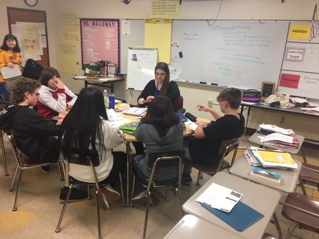 Diving into Conversation:  Miss Maloney digs into Ghost Boys with insightful conversation with her students.  Excitement is building as students are meeting in book clubs to explore themes and more.  <a href="/Hamilton_GMS/">Hamilton Garfield</a> #BigBlueOnTheMove @CoachMaloneyVB