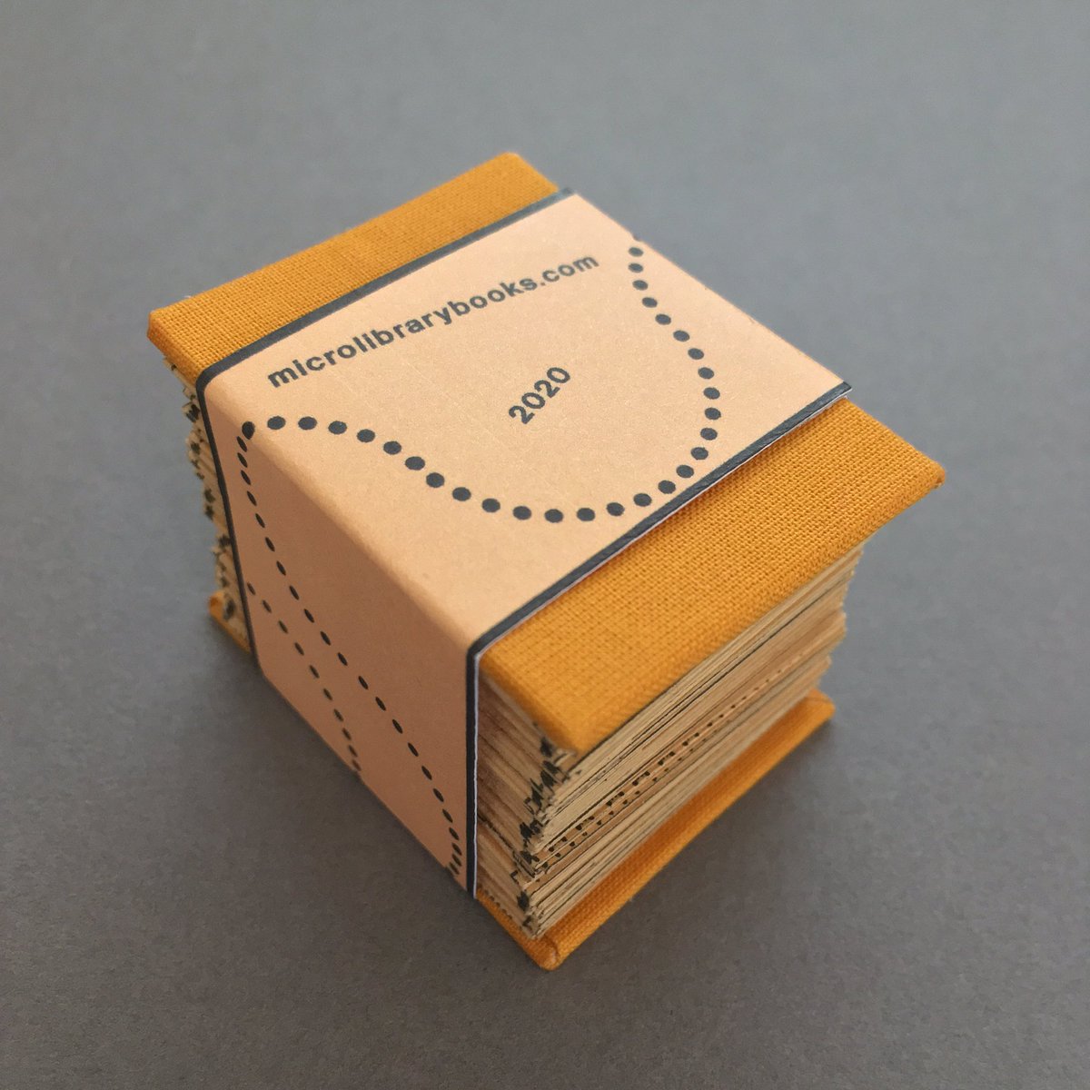 leeshearman's tweet image. My submission for International artists’ book exhibition ‘Love and Music’ is titled Гобеле́н (Tapestry). I punched six hundred and sixty-two 2mm holes into a 13 foot long paper strip, and accordion-folded it into a 120-page book...