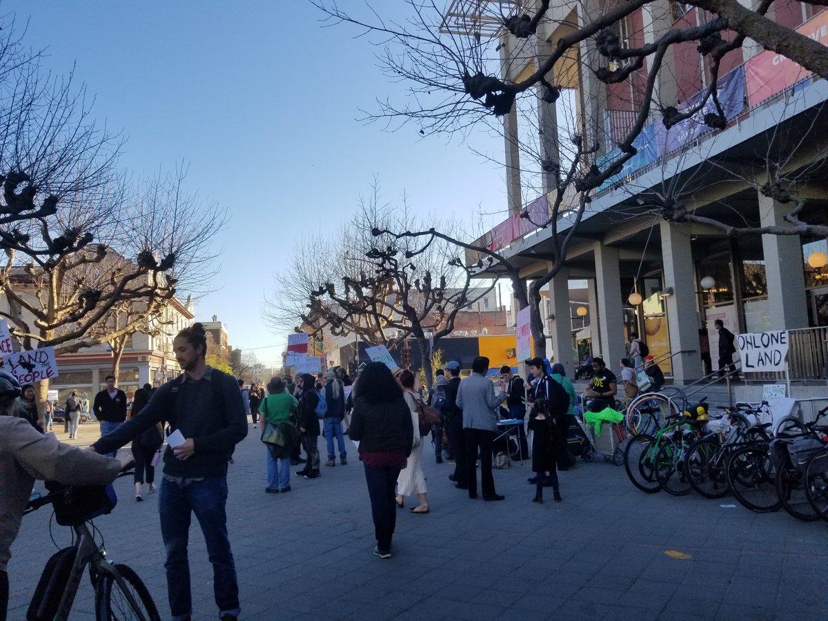 a_p_feldman's tweet photo. Protesters have started gathering in Sproul Plaza in opposition to the proposed development at People's Park, while an open house on the development is going on in MLK #berkprotest https://t.co/l6hi31hK12