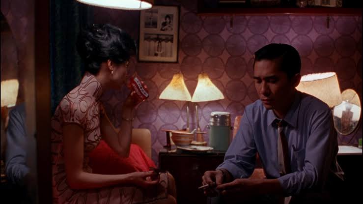 in the mood for love (dir. wong kar-wai, 2000)- a journalist & a secretary are neighbors & they both suspect their spouses are cheating on them with each other- they develop a platonic friendship but eventually catch feelings for each other- wong kar-wai films are so beautiful