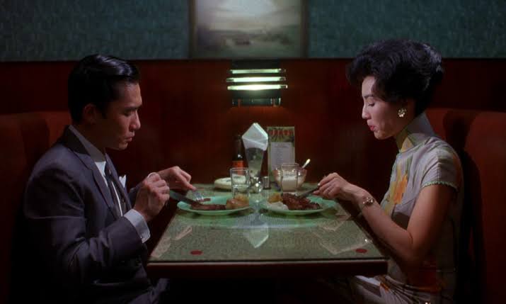 in the mood for love (dir. wong kar-wai, 2000)- a journalist & a secretary are neighbors & they both suspect their spouses are cheating on them with each other- they develop a platonic friendship but eventually catch feelings for each other- wong kar-wai films are so beautiful