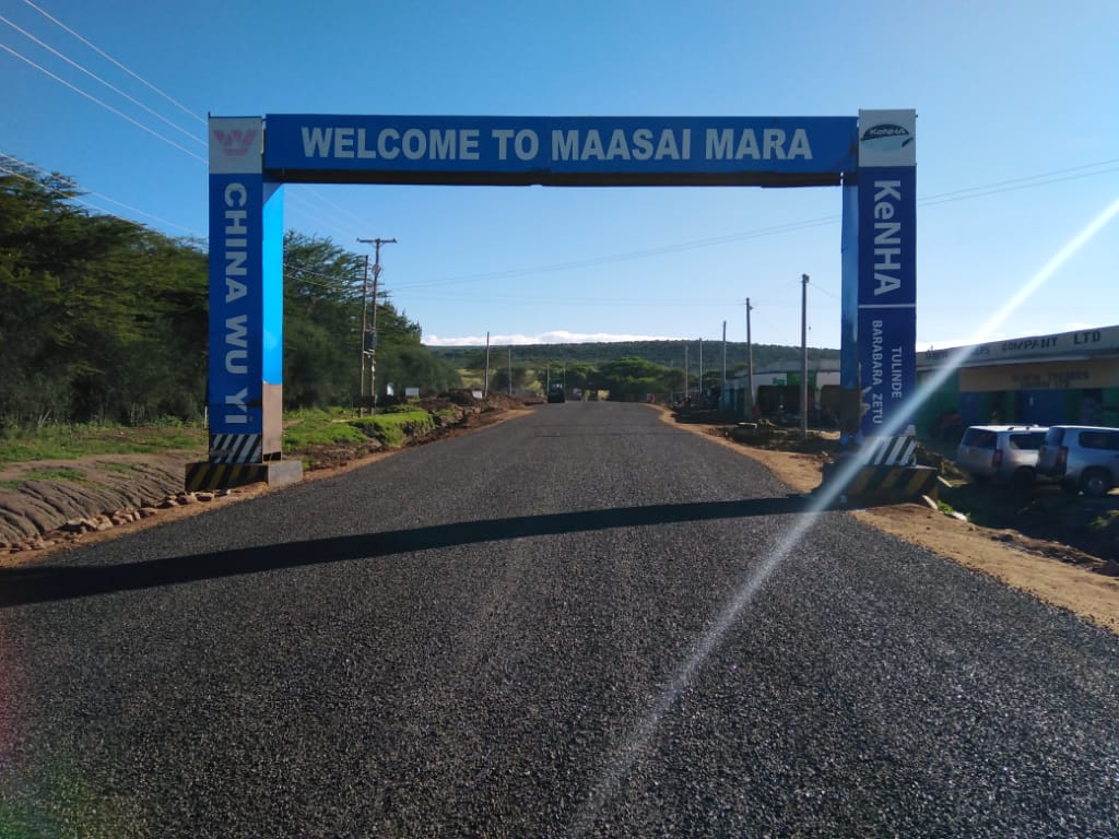 mohammedhersi's tweet photo. To @KeNHAKenya I thought we are paying for this Masai Mara Rd &amp; it is NOT some donation. What is the name of the contractor doing here? Some things just don't add up. Masai Mara is one of prime attraction globally then this advertisement. Please take it off. @NarokCountyGov1 https://t.co/l9ooaSyJh2