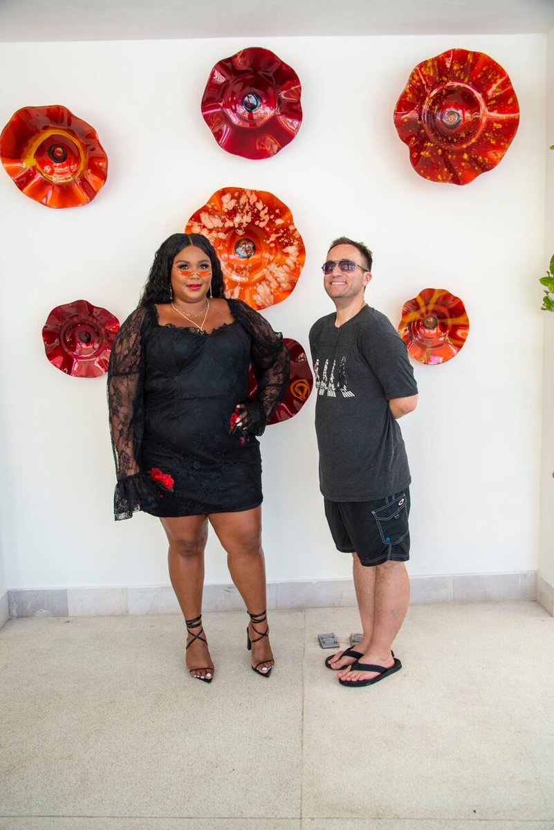 Happened to have just come out of the pool after being thrown in...tried to put my arm around Lizzo for the picture. Bad idea...”Oh, you’re REAL wet...” Resulting in the distance between us here...